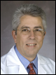 John B. Holcomb, MD