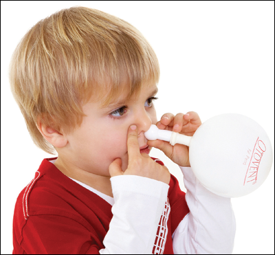 Child Demonstrating Nasal Balloon Device