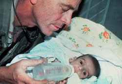 Figure 10: This infant from the refugee camp still had a good appetite but needed immediate nutritional resuscitation.