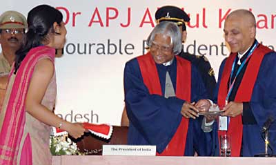 On the dias during the inauguration of the progam