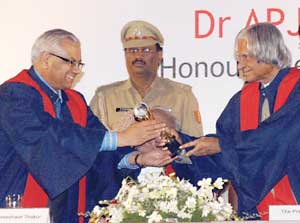 Dr. Jain received an award from the President of India