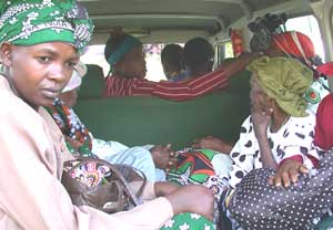 Women being driven to the hospital for surgery in Africa