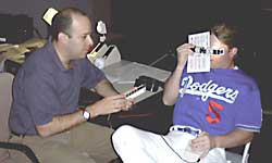 Daniel M. Laby, MD, administering a contrast sensitivity test to member of the Los Angeles Dodgers