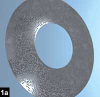 Figure 1a: The AcuFocus is a small corneal inlay