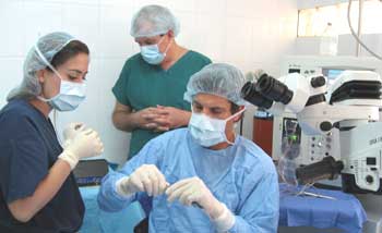 Angela Nakashyan helps Dr. Davidorf prepare for their first case