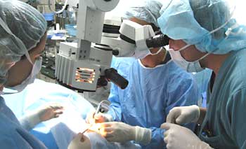 Dr. Carlos Gonzalez observes Dr. Davidorf's cataract surgery