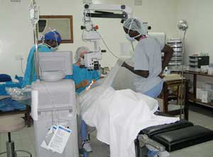 Volunteer Richard T. Kasbeer, MD, performs cataract surgery