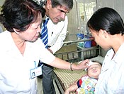 Oliver Foot visits the pediatric ward of an eye care hospital in Vietnam