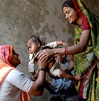 Three generations of women at the Sadguru Netra Chikitsalaya Eye Hospital in Chitrakoot, Madhya Pradesh, India. According to officials, two out of every three people around the world who are blind are women