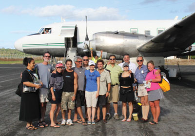 The Hawaiian Eye Foundation Tonga team from September 2009 is ready to board a 1950s era airplane to travel to the smaller islands. 