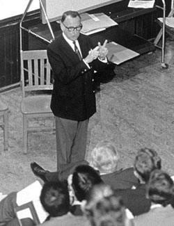 Joseph H. Boyes, MD, an ASSH founder, is shown educating would-be hand surgeons at an early meeting of the society.  He was tapped as the first editor of the Journal of Hand Surgery.