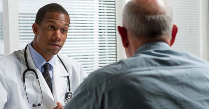 primary care physician talking with patient