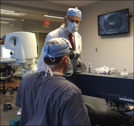 Arthur A. Medina Jr., OD, assists while Gregory Parkhurst, MD, performs LASIK. 