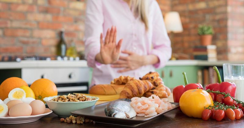 woman saying no to allergenic foods