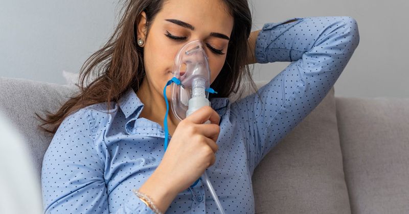 woman using a nebulizer