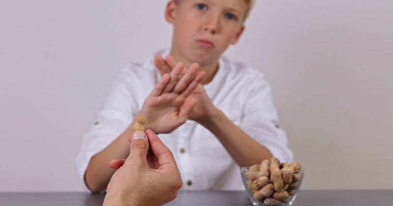 boy saying no to peanuts