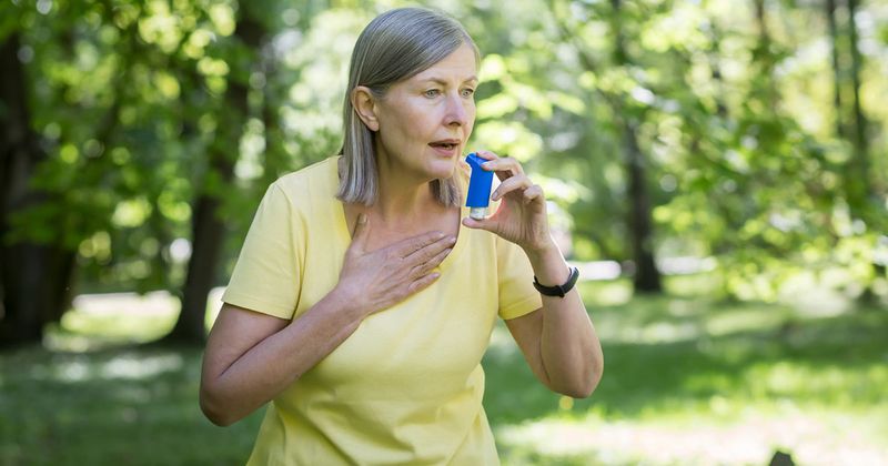 woman using an inhaler