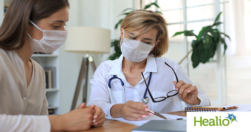 Doctor and female patient talking