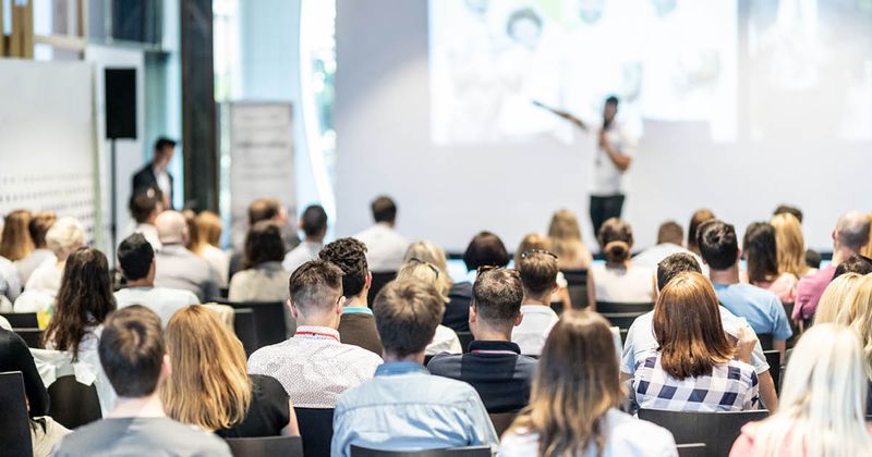 Professionals gather for a conference