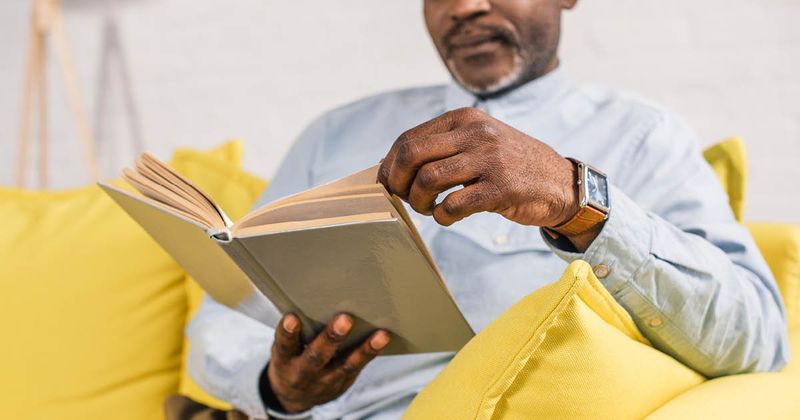 adult man reading