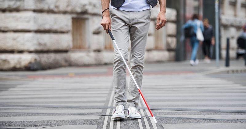 blind person walking