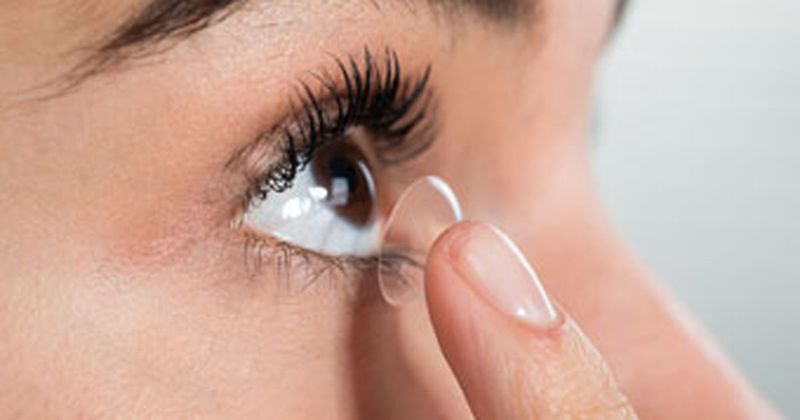 image of contact lens insertion