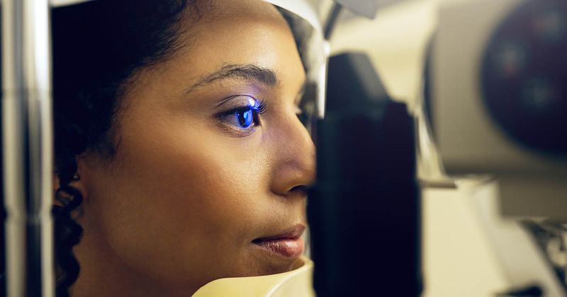 woman getting eye examined