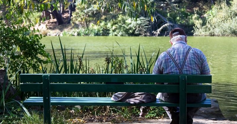 man alone on a bench