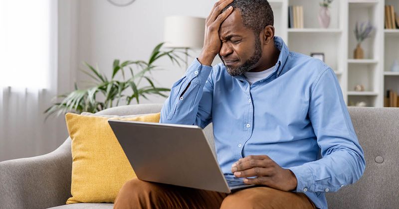 man struggling to concentrate