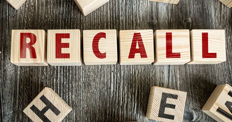 wooden blocks spelling 'recall'