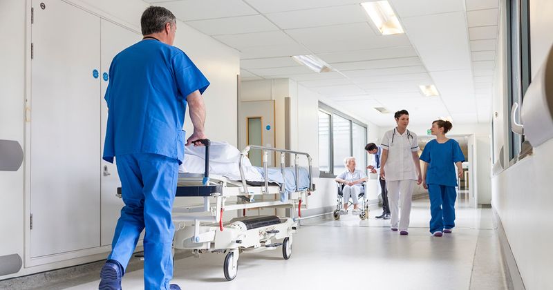 Stock photo of patient in hospital bed