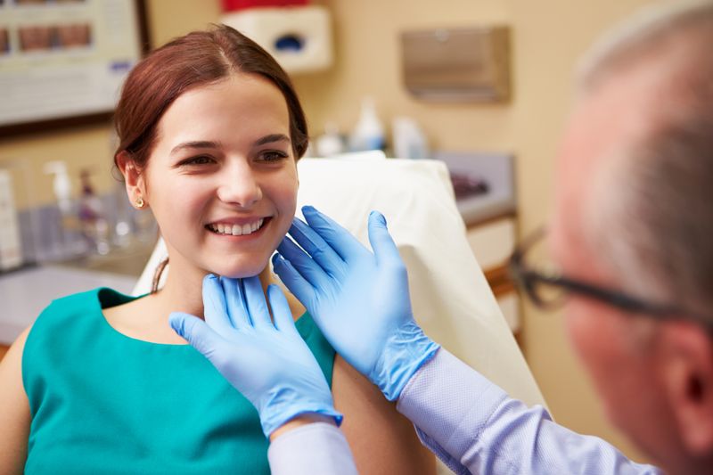 patient smiling during consultation 