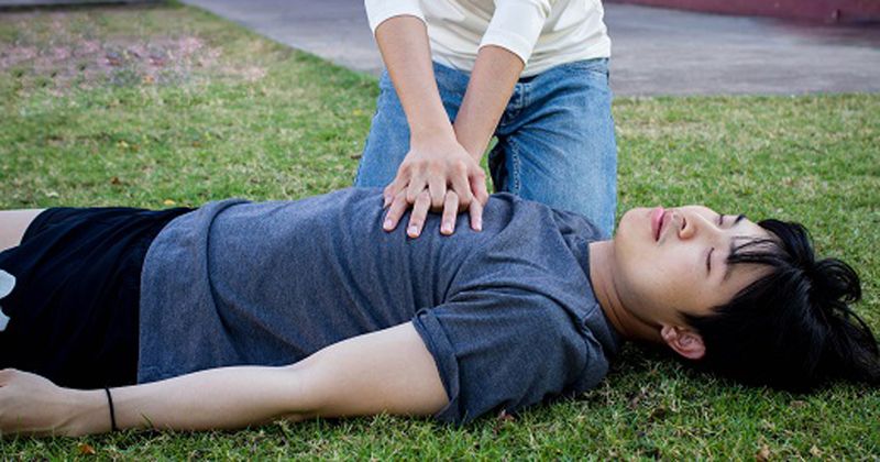 adolescent receiving CPR