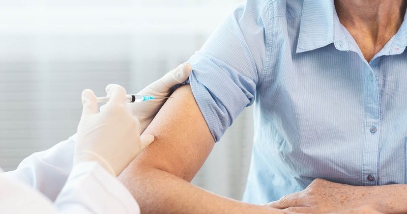 person getting a flu shot