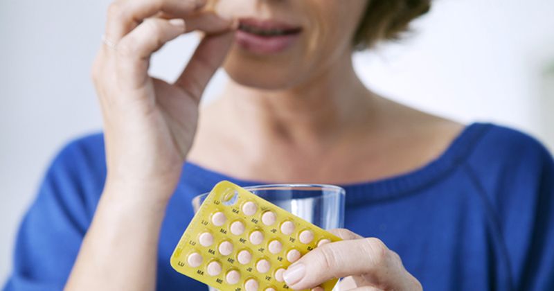 women taking contraceptive pill