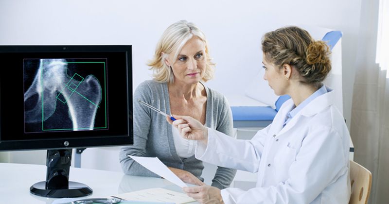 Osteoporosis consultation with older woman 2019