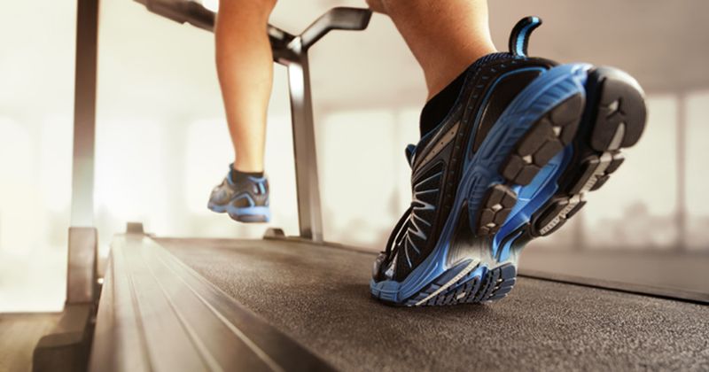 A person running on a treadmill.