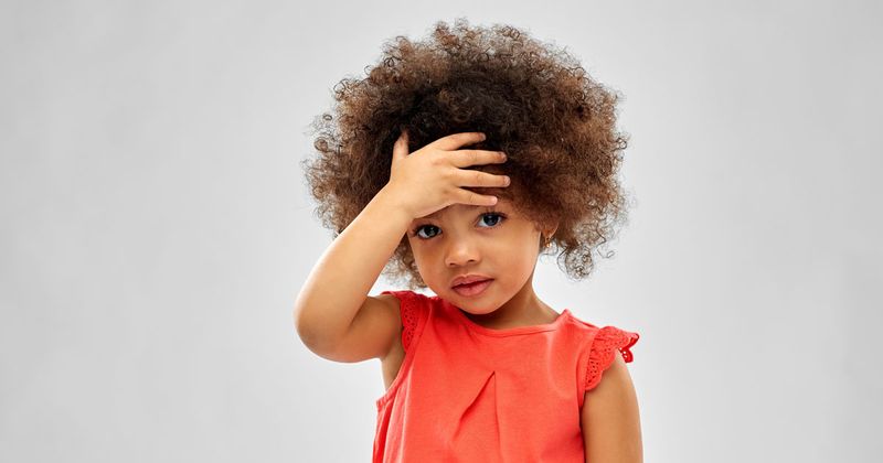 Young girl with headache