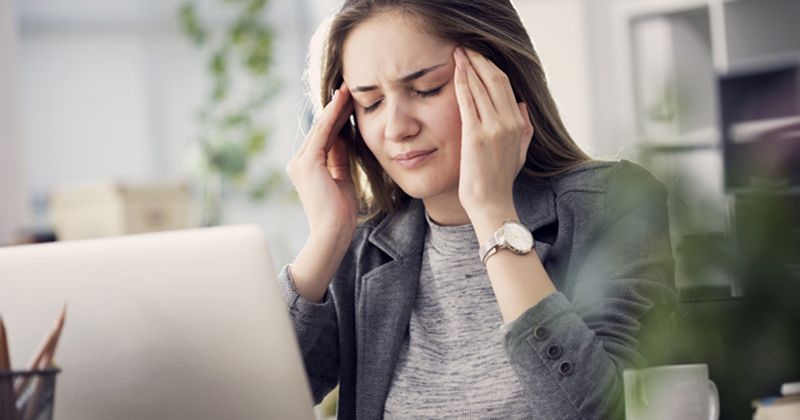 Younger woman with headache