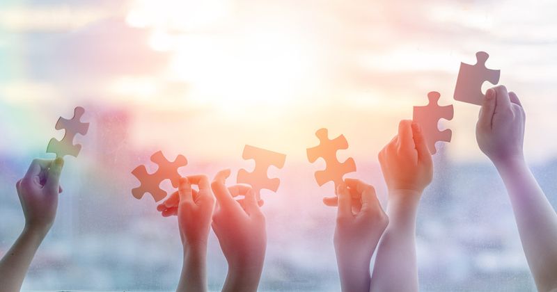 Autism Symbol - Kids Holding Puzzle Pieces