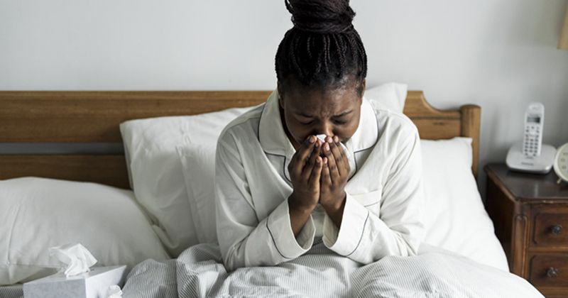 Black woman with the flu