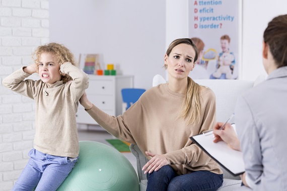 Child, Mother, At Doctor But Not Happy