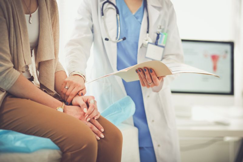 Doctor with female patient