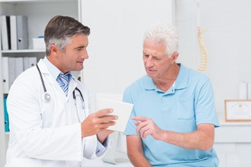 Doctor with older male patient