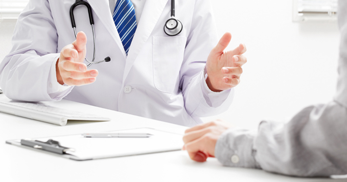 Doctor consulting with patient