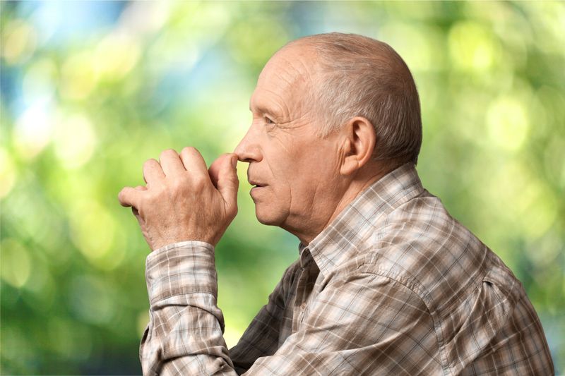 Elderly man thinking