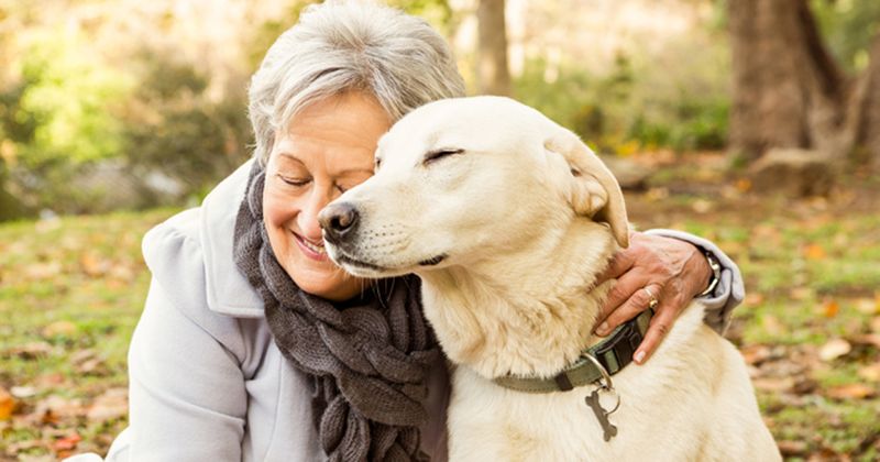 Elderly woman with dog