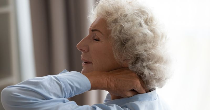 Older white woman with neck pain