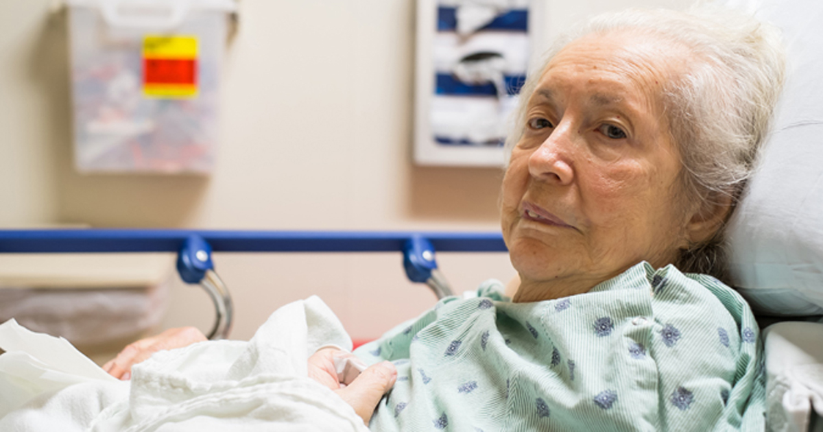 Older woman in hospital bed