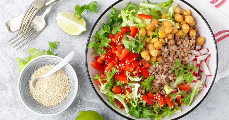 a bowl with salad and chickpeas